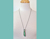 Parrot Wing Chrysocolla Pendant Necklace on model
