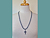 Vintage Russian Enamel Cross Necklace on model